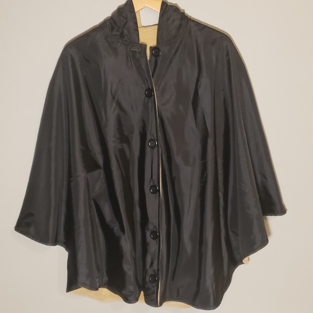 Cape coat.